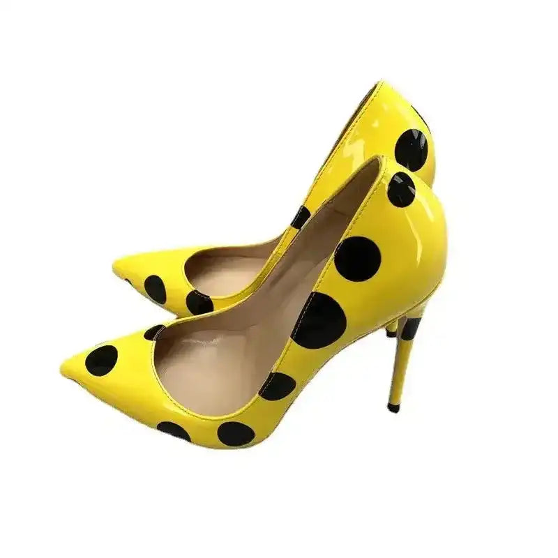 Polka Dot Yellow Stiletto High Heels Shoes with glossy finish and pointed toe, perfect for fashion-forward looks. FashionFitz pumps in bold yellow.