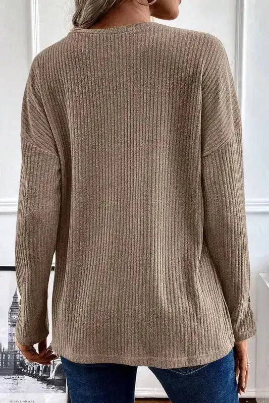 Back view of beige Rib Knit Henley Top showcasing ribbed texture and relaxed fit, ideal for cozy autumn wear.