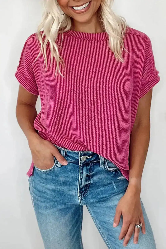 Rose Red Knit T-shirt with textured fabric and rolled sleeves, styled casually with blue jeans for summer daily wear.