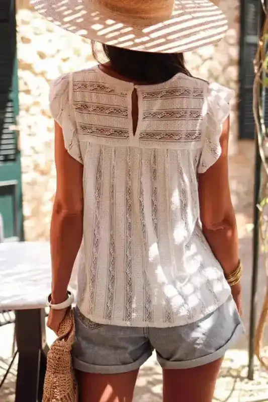 Back view of White Ruffled Lace Flowy Tank Top showing lace detailing and keyhole closure, ideal for warm-weather outfits.