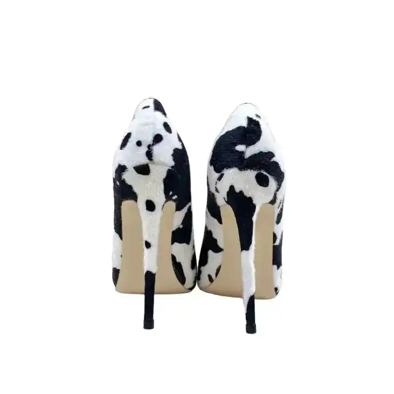 Back view of Urban Artistry Stilettos showing symmetrical graffiti print and slim stiletto heels, perfect for bold fashion statements.