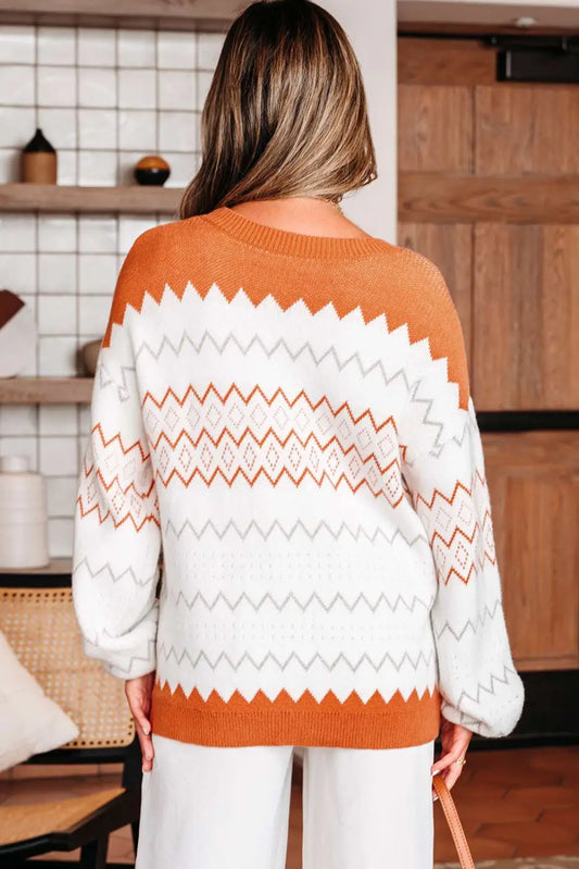Person wearing Zigzag Cozy Knit Jumper in a kitchen setting