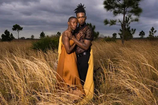 Fashion Industry Trends Showcase with Models in Elegant Dresses in a Field Setting