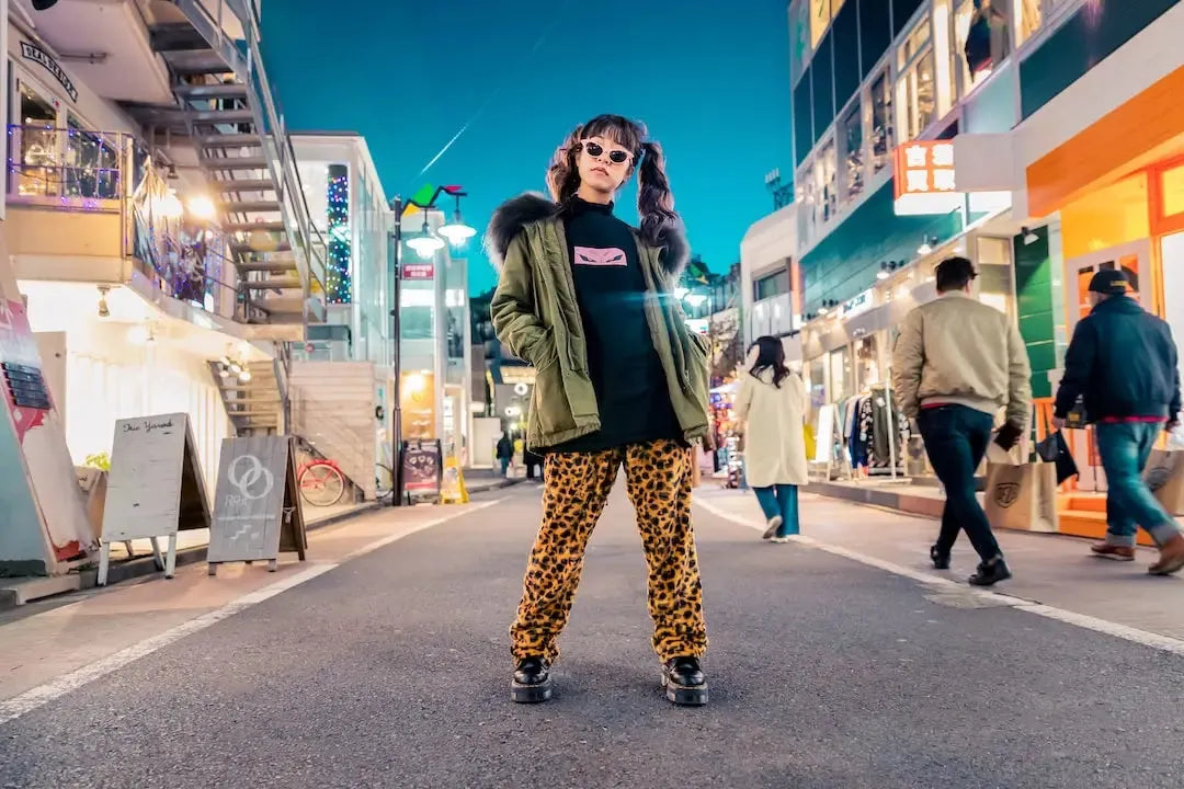 Street style showcasing autumn fashion trends UK with bold colors and animal print pants