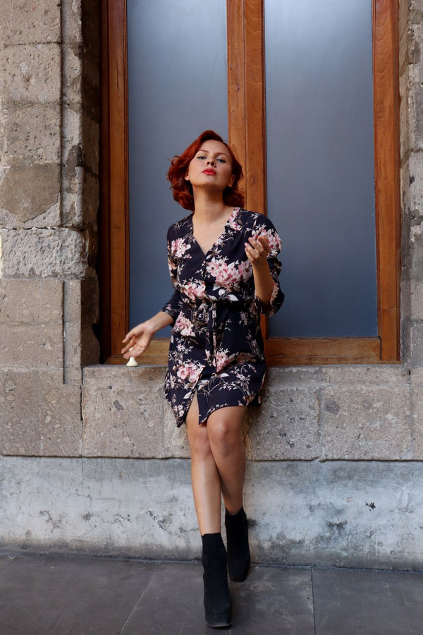 Woman in feminine ruffle detail dress summer 2026
