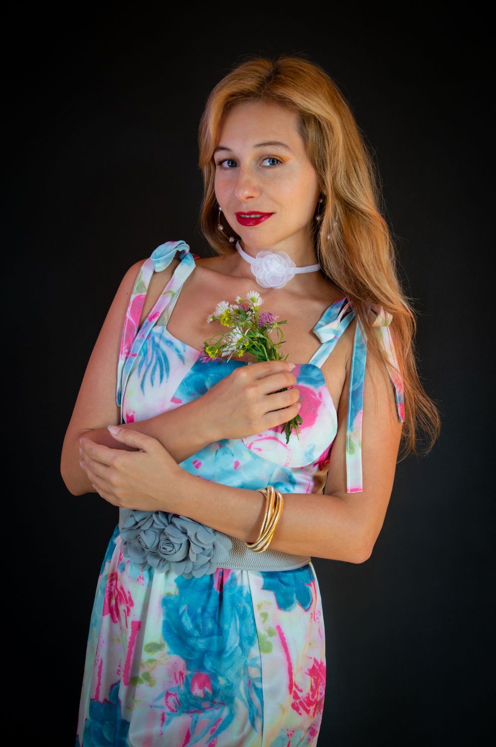 Elegant woman in puff sleeve blouse with flowers UK 2026