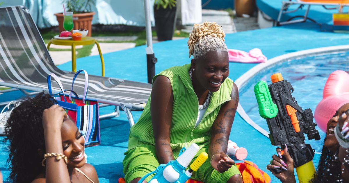 Friends enjoying a vibrant summer pool party - pool party outfits 2026
