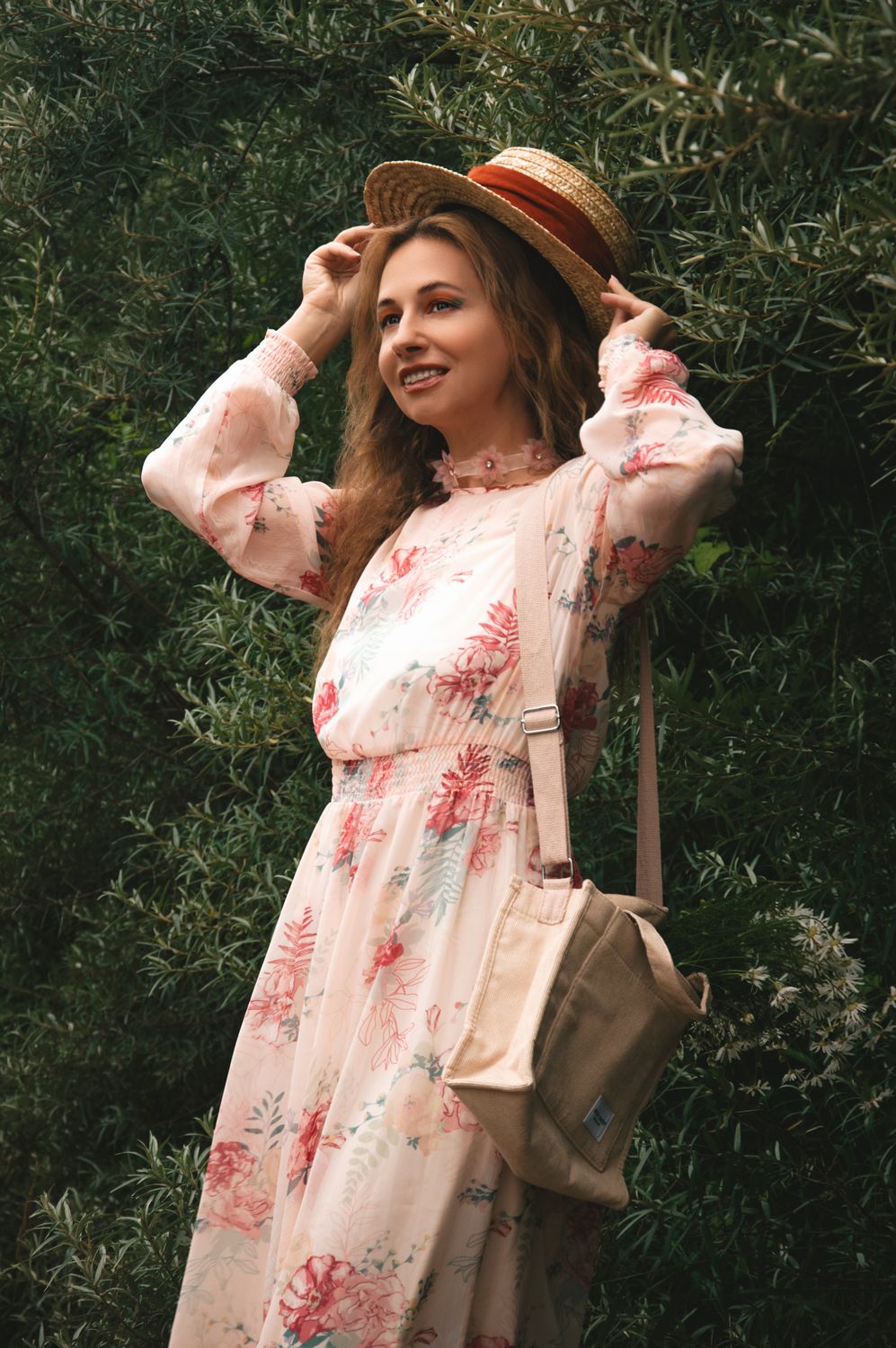 Woman in swimwear cover-up dress with straw hat holiday UK 2026