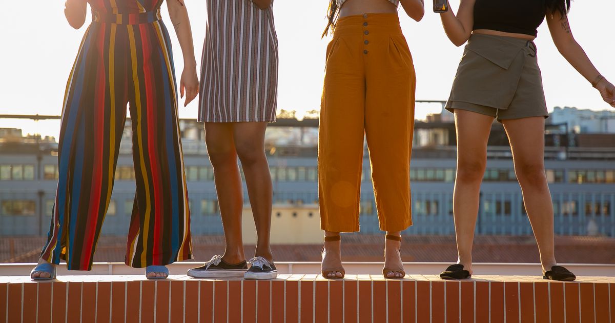 Women friends in stylish summer clothes at rooftop bank holiday gathering 2026