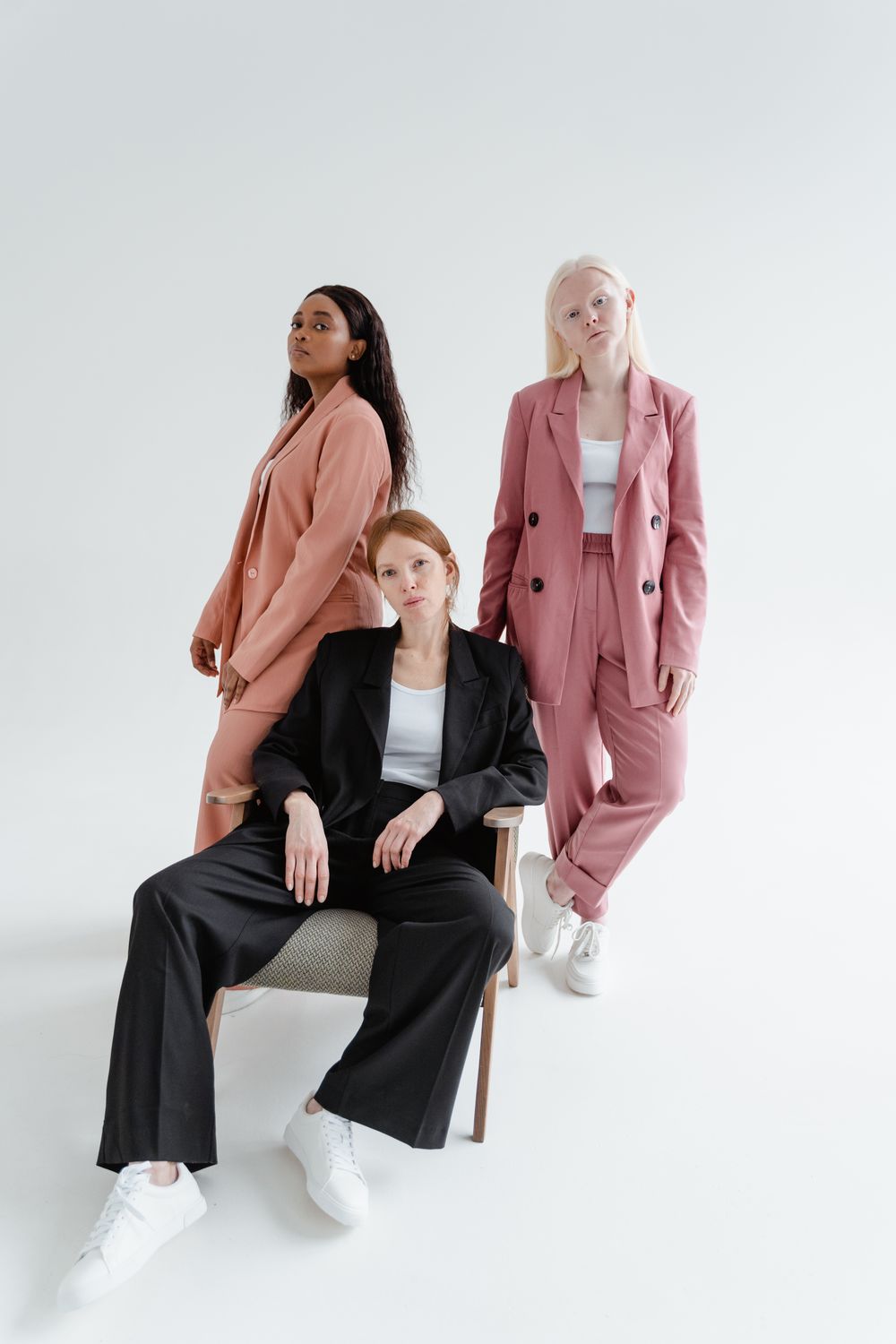 Women in blazer outfits posing confidently UK 2026