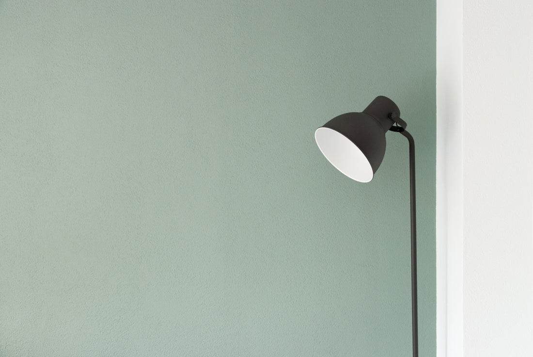 black floor lamp at the corner