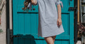 Woman in transitional summer to autumn outfit - transitional fashion guide 2026