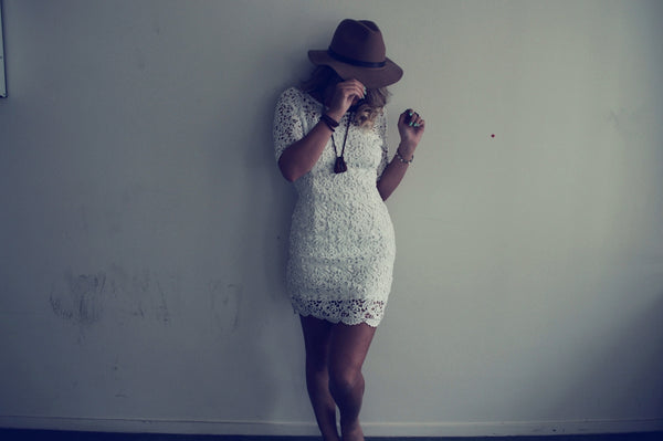 woman wearing 2-tone white floral dress
