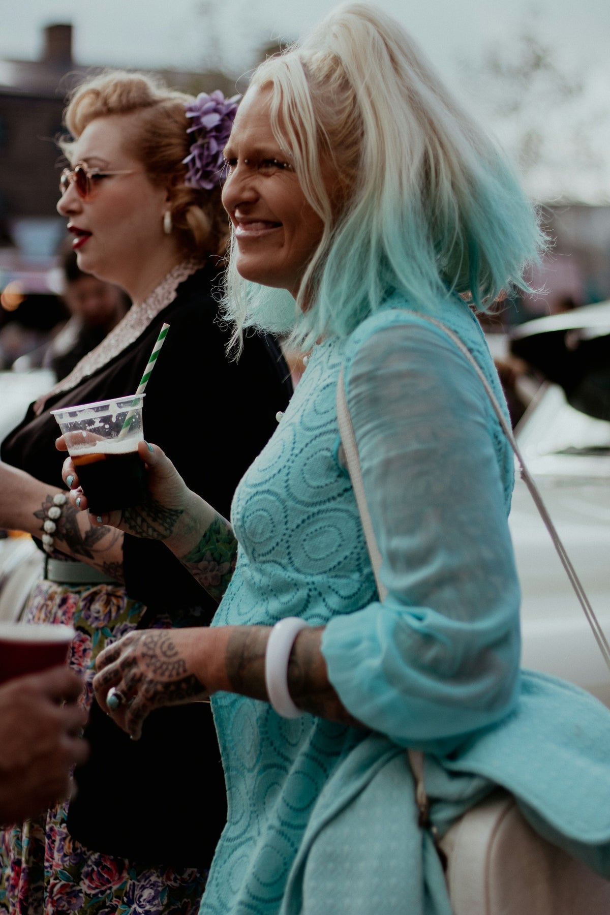 a group of women standing next to each other