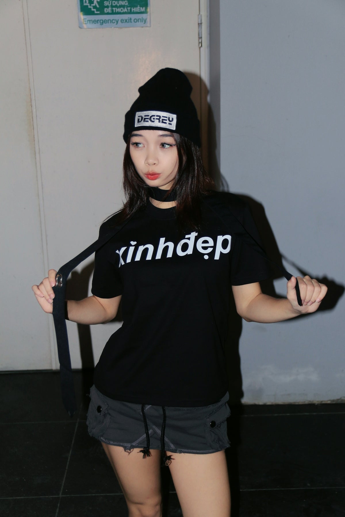 a woman holding a pair of scissors in her hands