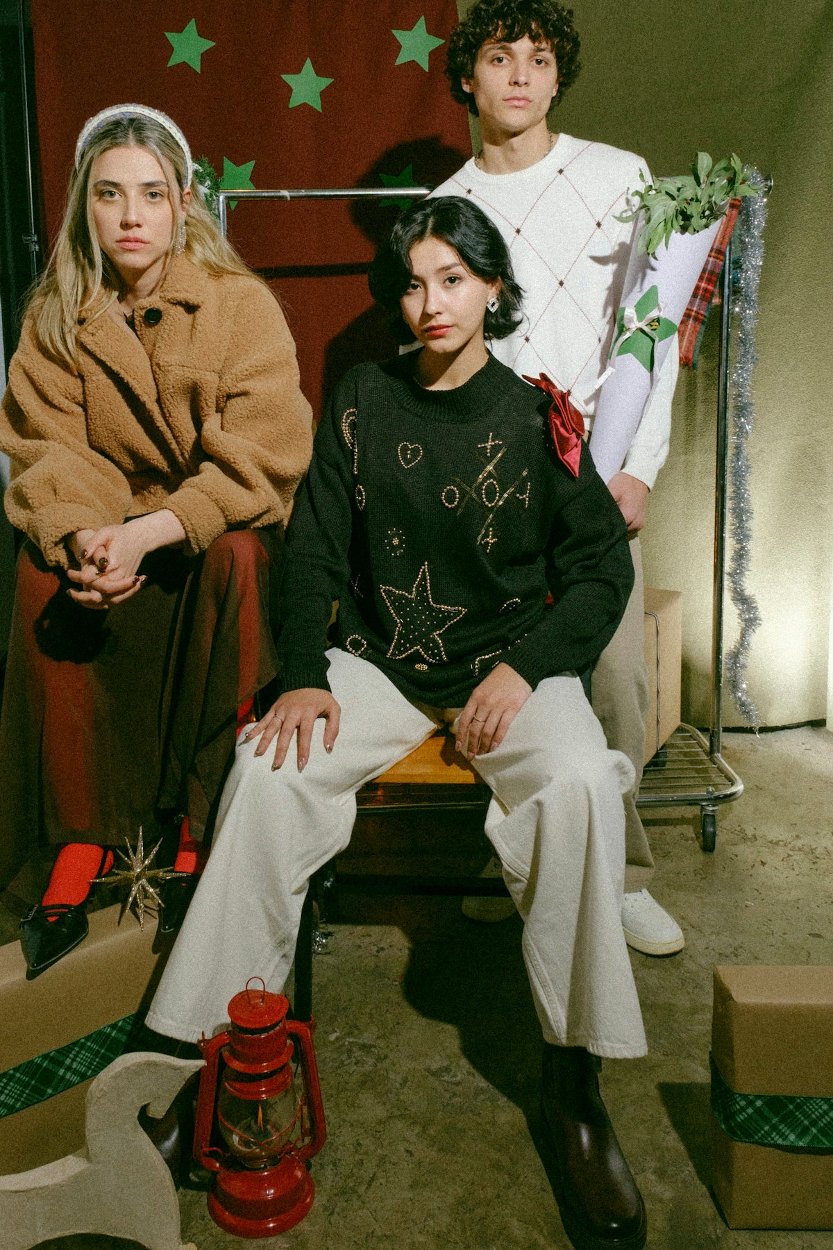 A group of people sitting next to each other