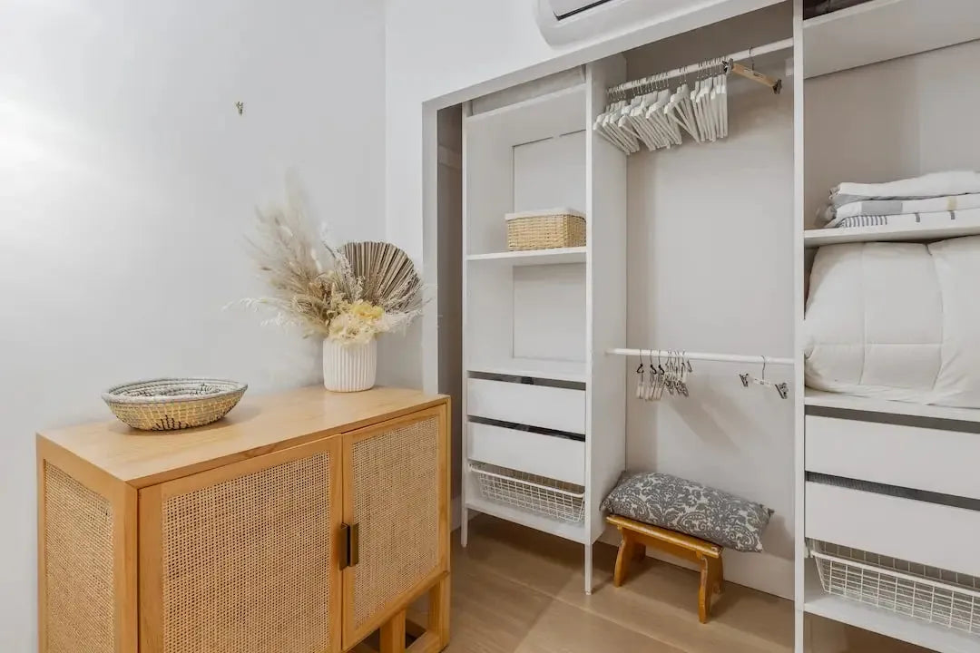 Stylishly organized closet featuring the Fashionfitz blouse collection and minimalist decor
