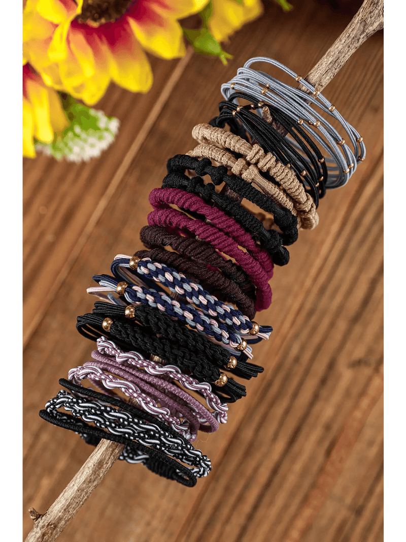 Variety of trendy women's fashion accessories including hair ties and elastics in different colors and styles