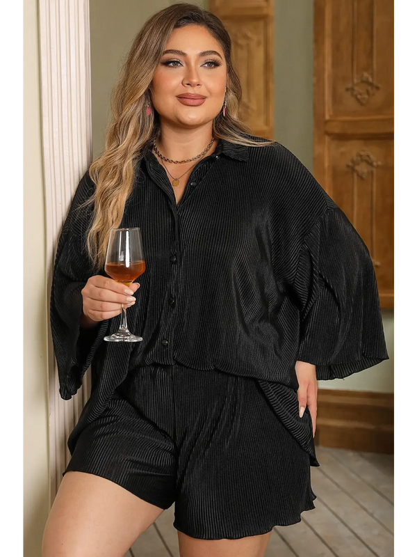 Stylish model showcasing Plus-Size Loungewear in a chic black outfit, perfect for relaxing at home
