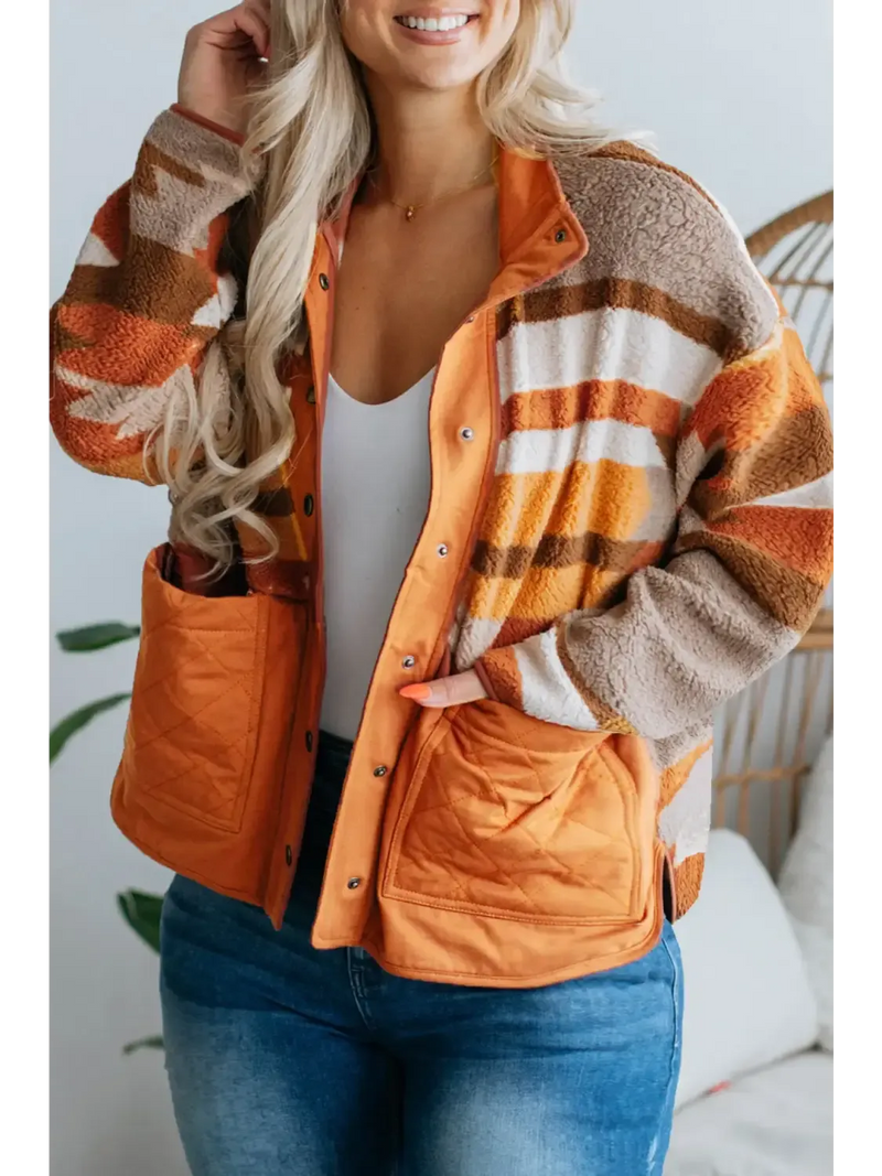 Stylish Plus-Size Outerwear featuring a cozy striped jacket with pockets, perfect for layering in any season