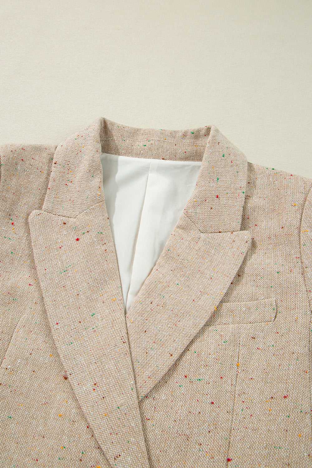 Flat lay of Ladies Light Beige Fitted Blazer - Casual Smart Office | FashionFitz showing inner lining and structured lapel design.