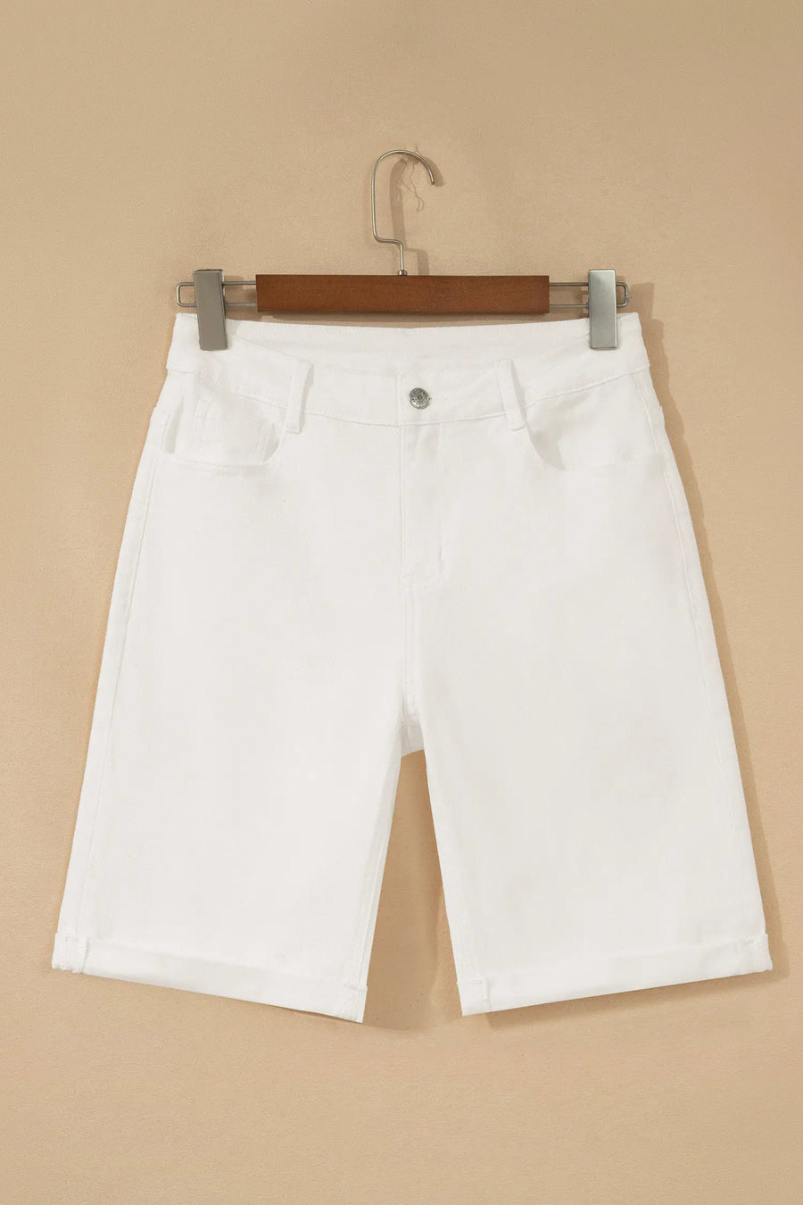 Women's white denim shorts side view rolled cuffs casual