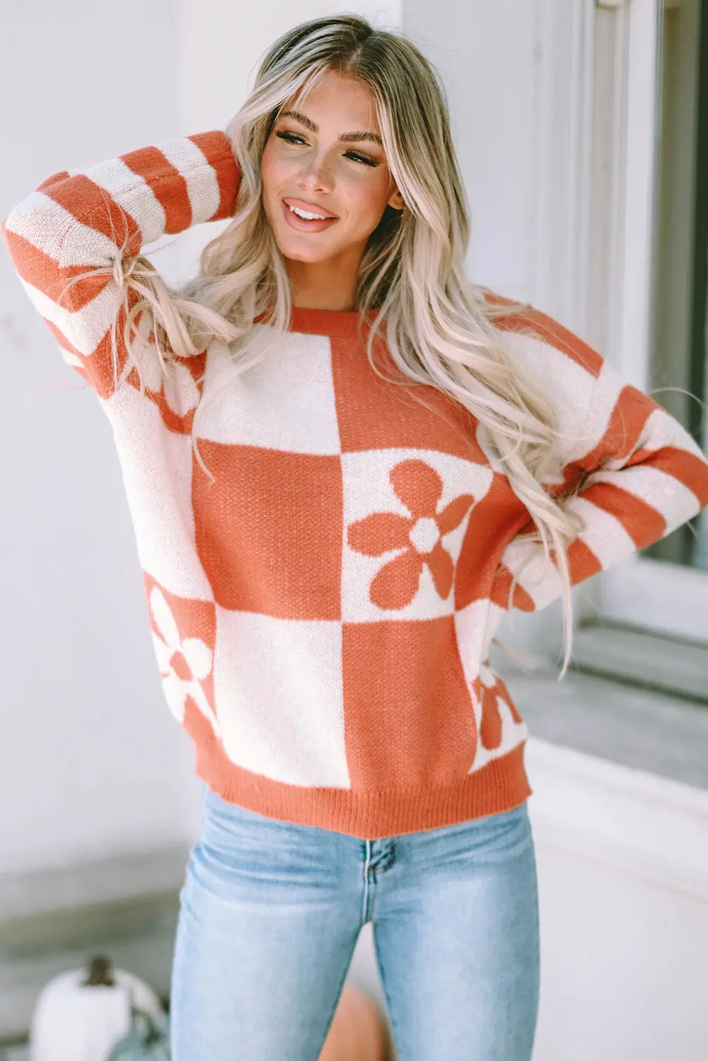 Woman wearing brown checkered floral print striped sleeve sweater front view Fashionfitz UK
