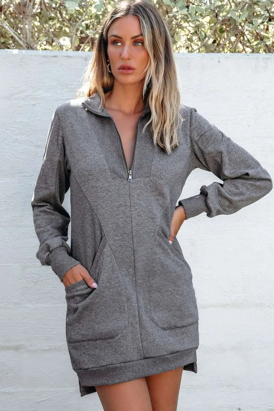 Gray version of the ladies zip-up sweatshirt mini dress with front pockets and ribbed detailing, great for casual outings.
