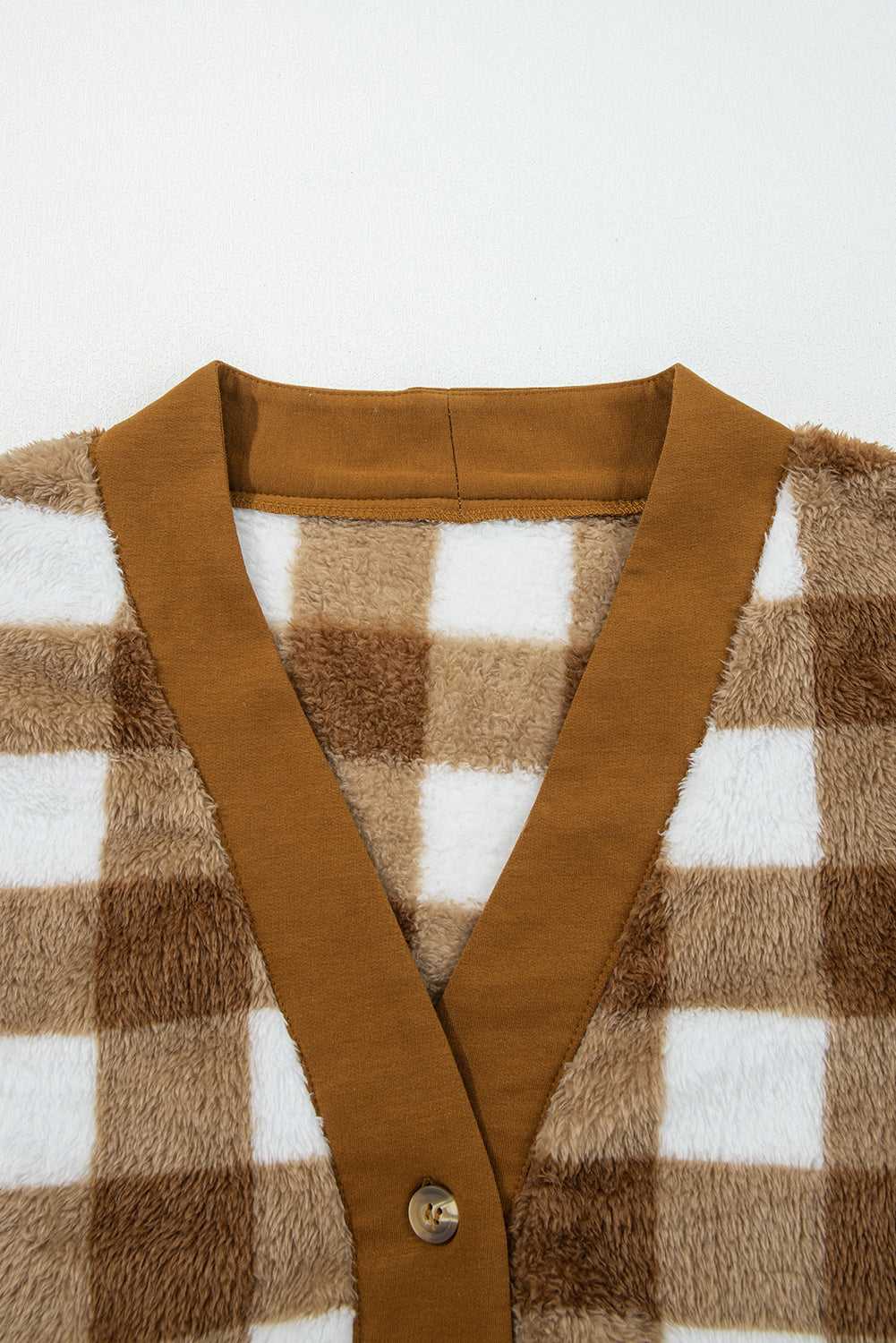 Neckline and button detail of Brown Checkered Sherpa Cardigan, highlighting V-neck design and cozy sherpa fabric for casual winter wear.