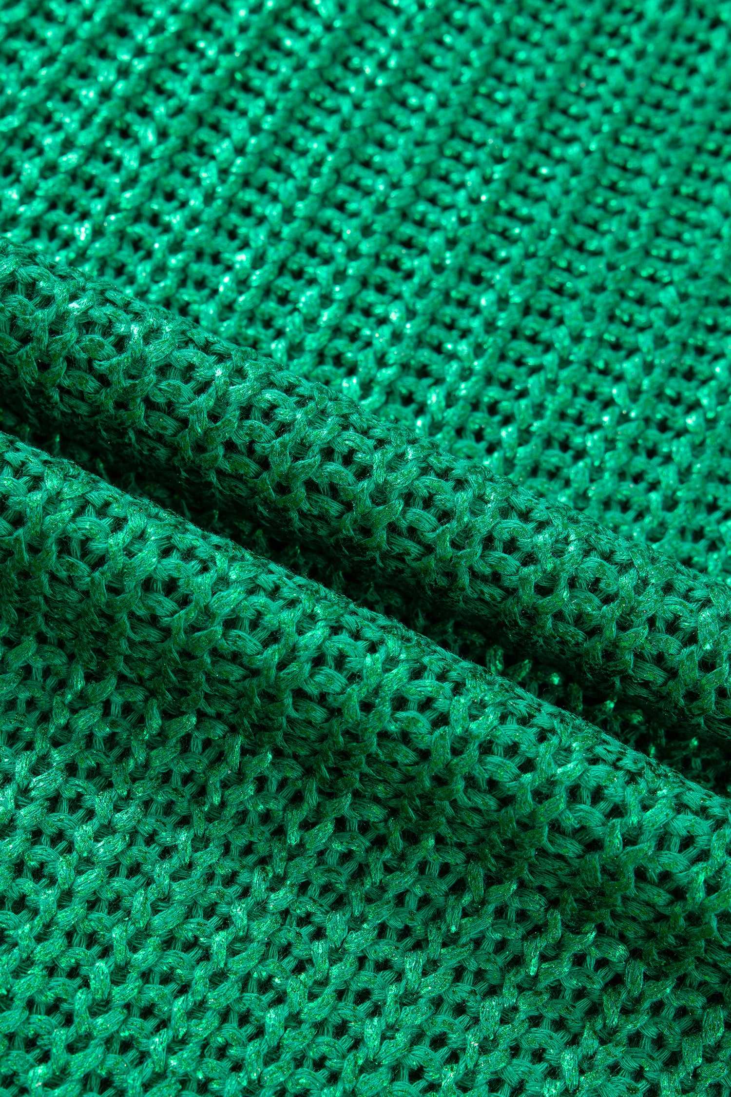 Close-up of green lustre knit fabric from the High Neck Knit Top Women, showcasing breathable open-knit texture and subtle sheen.