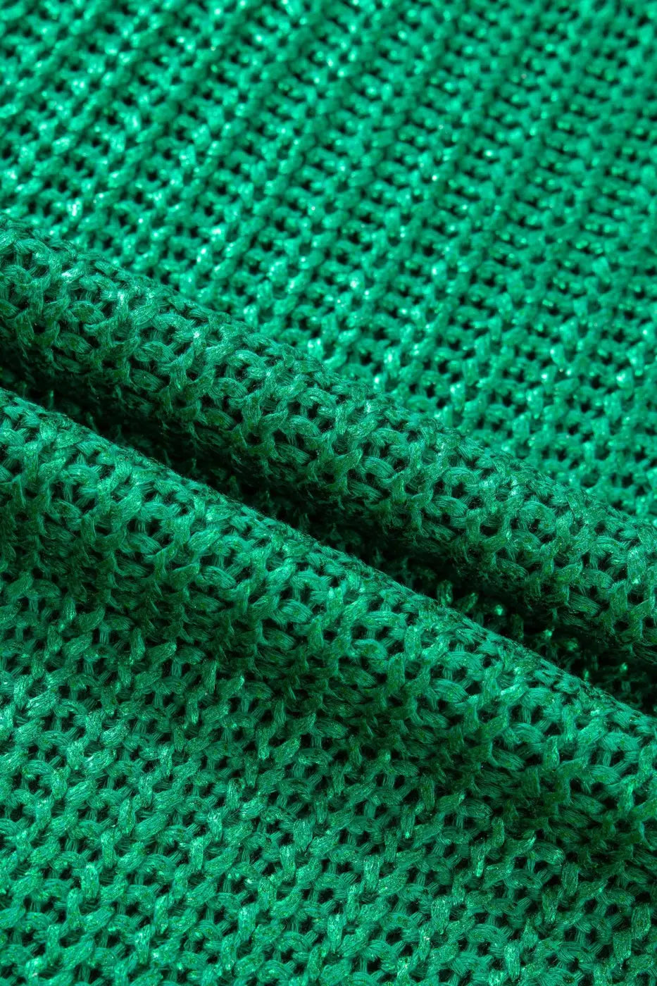 Close-up of green lustre knit fabric from the High Neck Knit Top Women, showcasing breathable open-knit texture and subtle sheen.