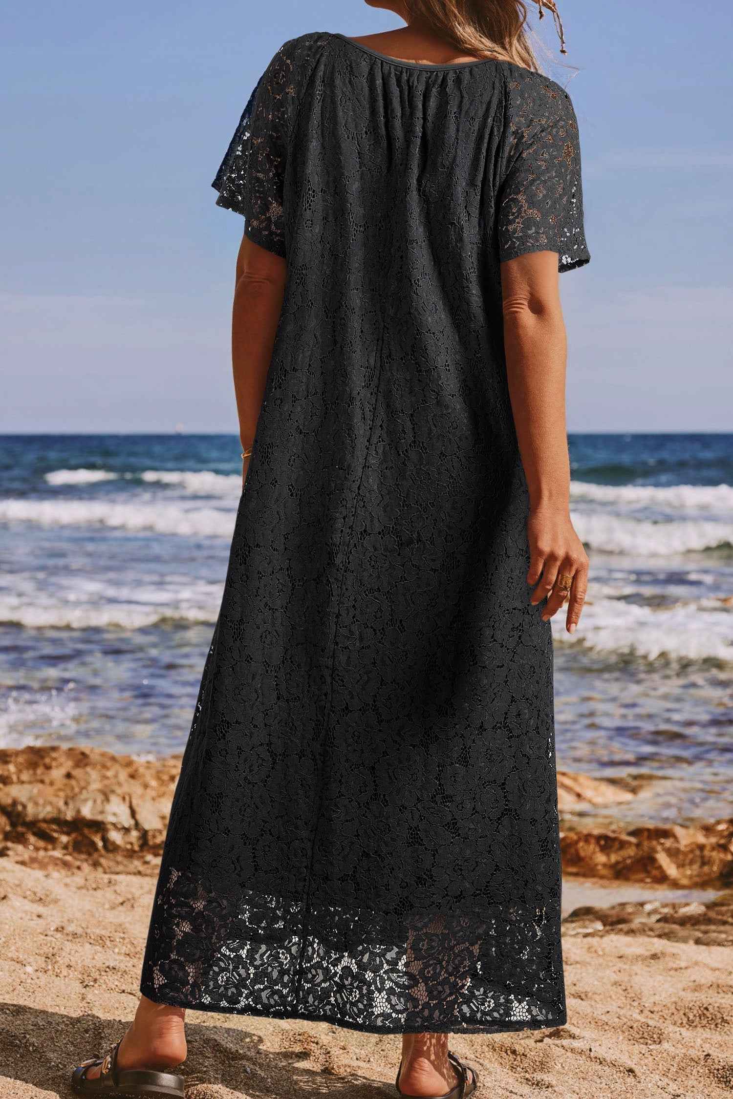 Back view of Black Lace Maxi Dress showing full-length floral lace overlay and relaxed fit, ideal for summer outings and vacation wear.