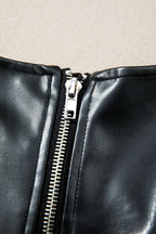 Detail of zipper on Ladies Black Faux Leather Mini Dress | FashionFitz showing silver hardware and clean stitching.