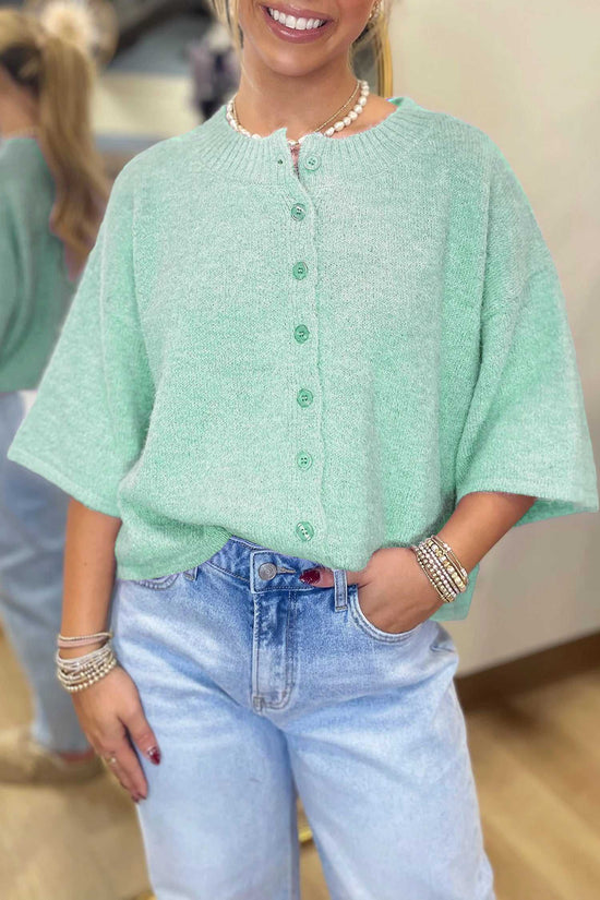 Pastel jade fuzzy knit cardigan women with 3/4 sleeves and boxy cut, paired with light-wash jeans for a soft casual style.