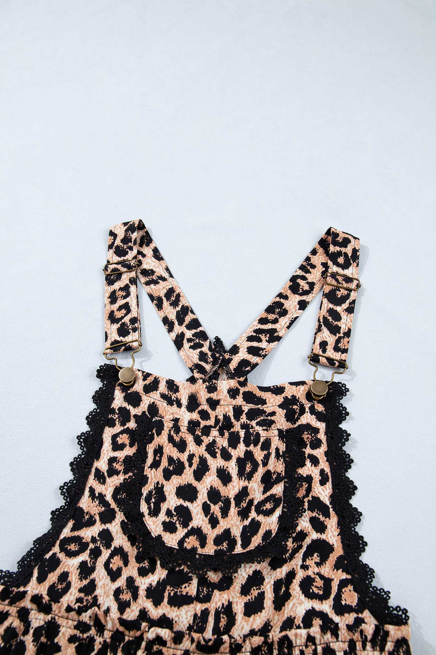 Close-up of Leopard Lace Trim Wide Leg Playsuit’s front pocket and lace detailing, emphasizing its stylish and functional design.