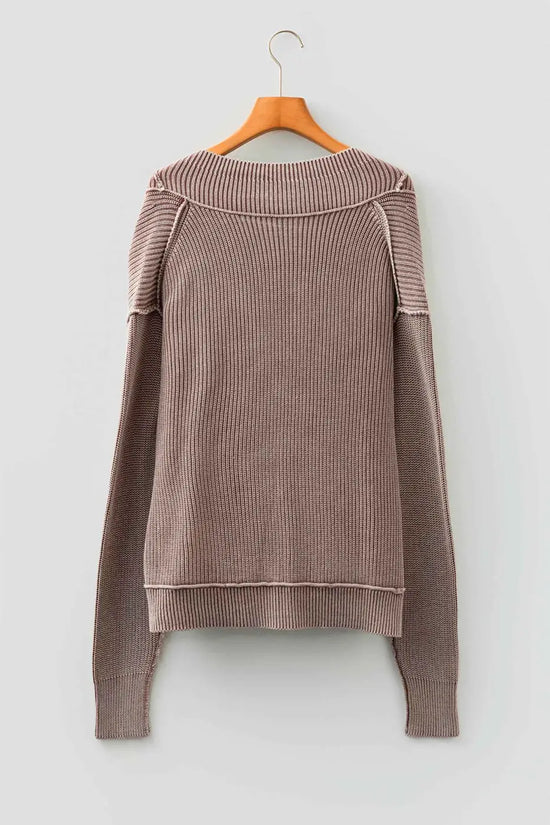 Back view of brown stonewash knit open cardigan on hanger, displaying ribbed knit texture and long sleeves.