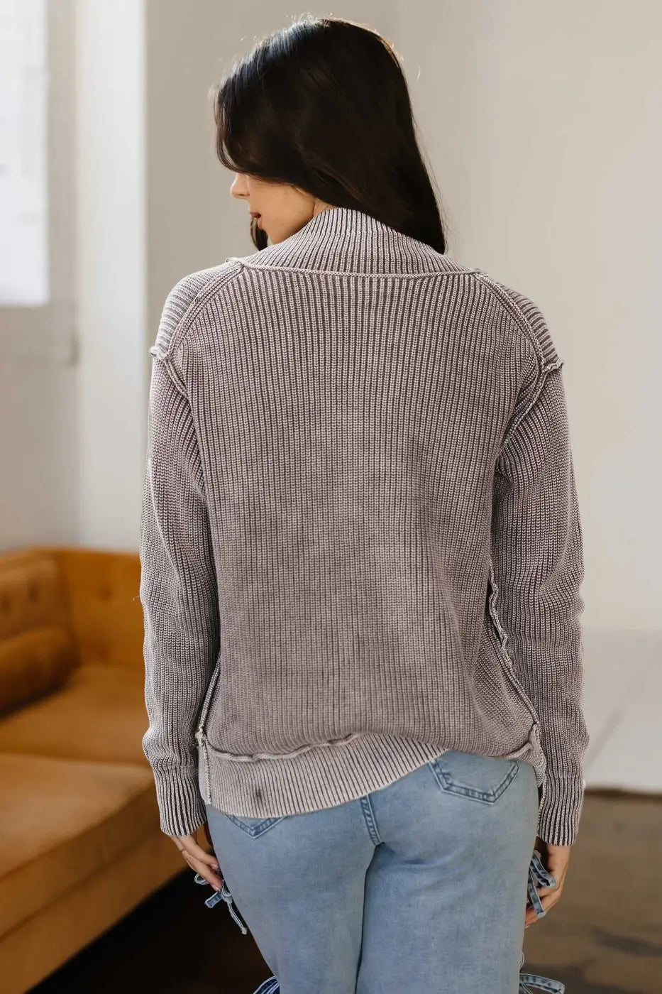 Back view of model in brown Women's Stonewash Patchwork Knit Open Cardigan, showing ribbed texture and relaxed fit.