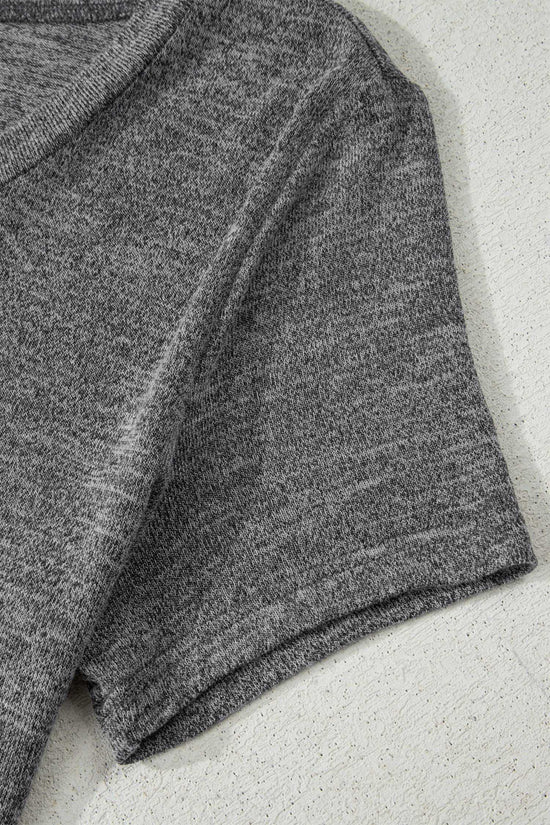 Sleeve detail of charcoal top from Heather Mauve Duster Lounge Trio – 3‑Piece Loungewear Set, emphasizing soft knit material and casual fit.