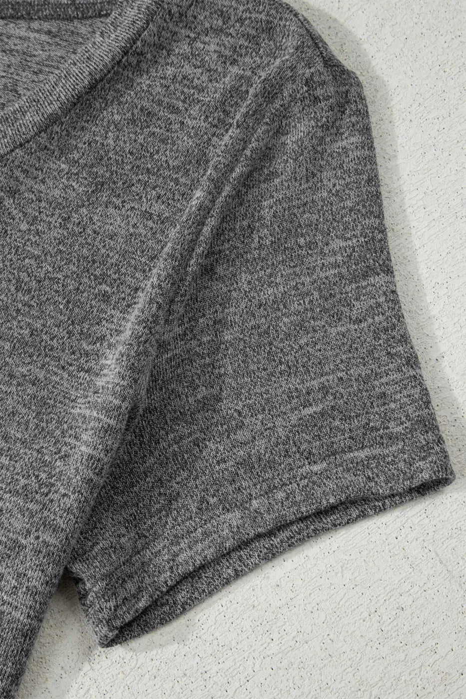 Sleeve detail of grey top from Heather Mauve Duster Lounge Trio – 3‑Piece Loungewear Set, highlighting soft-touch knit and relaxed fit.