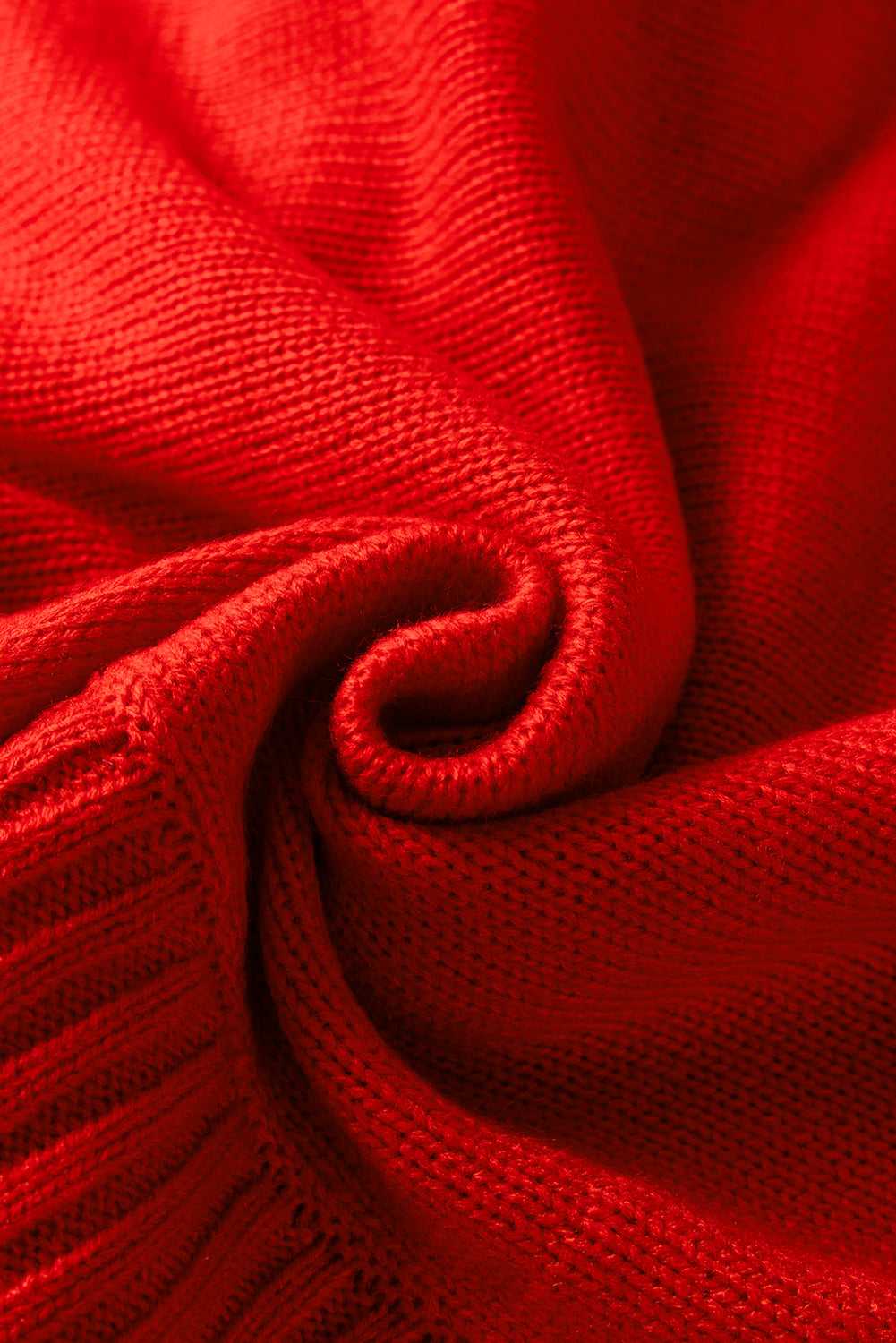 Close-up of soft red acrylic knit fabric, emphasizing the cozy texture of the high neck Christmas sweater.