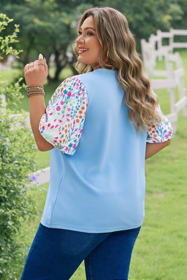 Light blue contrast floral sleeve plus size blouse — side view showing contrast sleeve