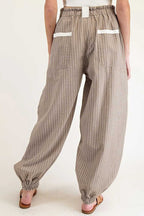 Back view of Women's Brown Stripe Cargo Joggers featuring elastic waistband and white-trimmed back pockets.