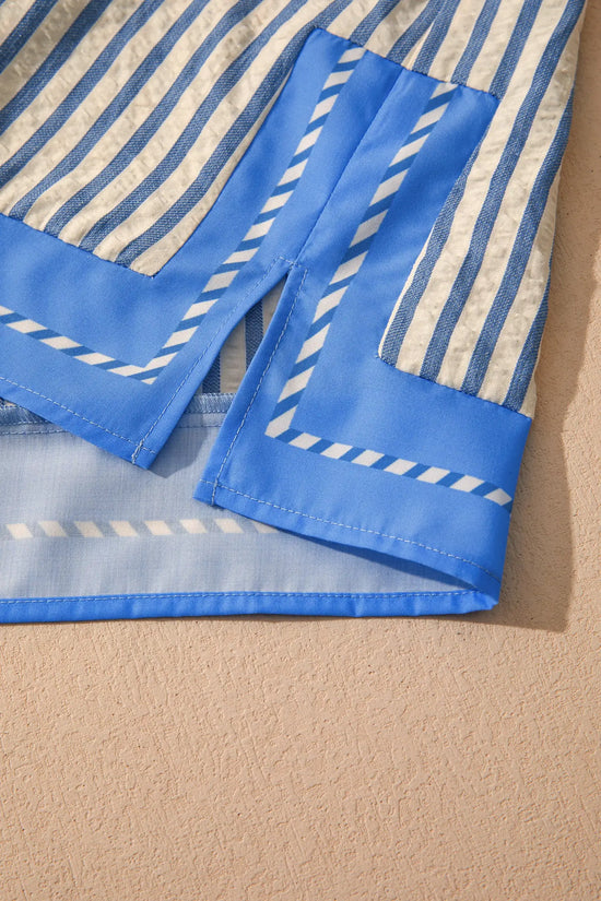 Styled flat lay — sky blue stripe colour block V-neck blouse | Fashionfitz UK