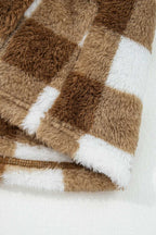 Close-up of soft sherpa fleece fabric on Brown Checkered Cardigan, highlighting plush texture and checkered pattern in brown and white.