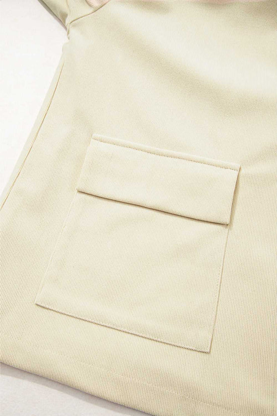 Close-up of front patch pocket on the Leather Collar Corduroy Jacket, showing fine corduroy texture and practical design.