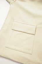 Beige fabric with a pocket on a light background