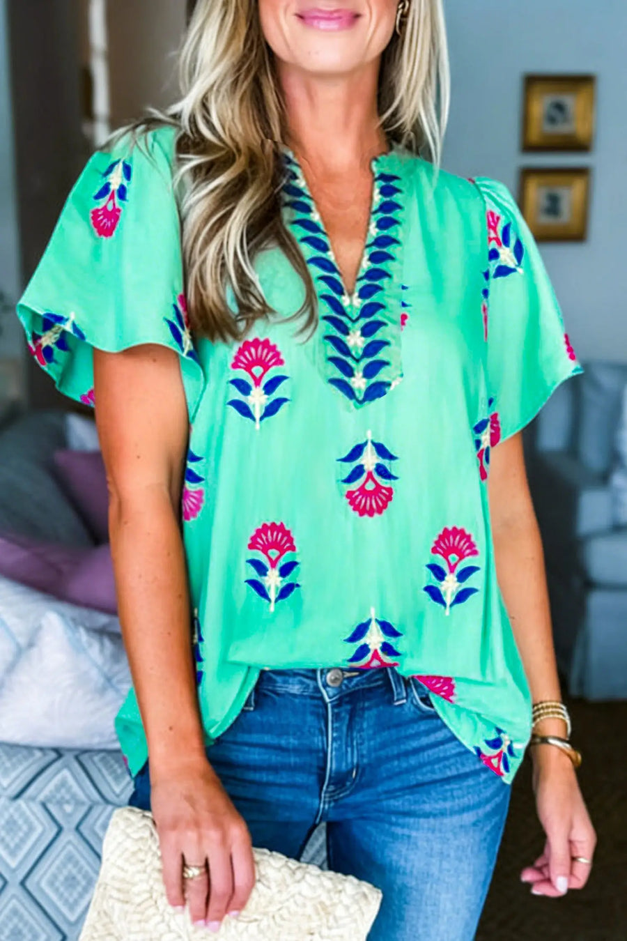 Flutter sleeve floral blouse — back view, lightweight summer fabric