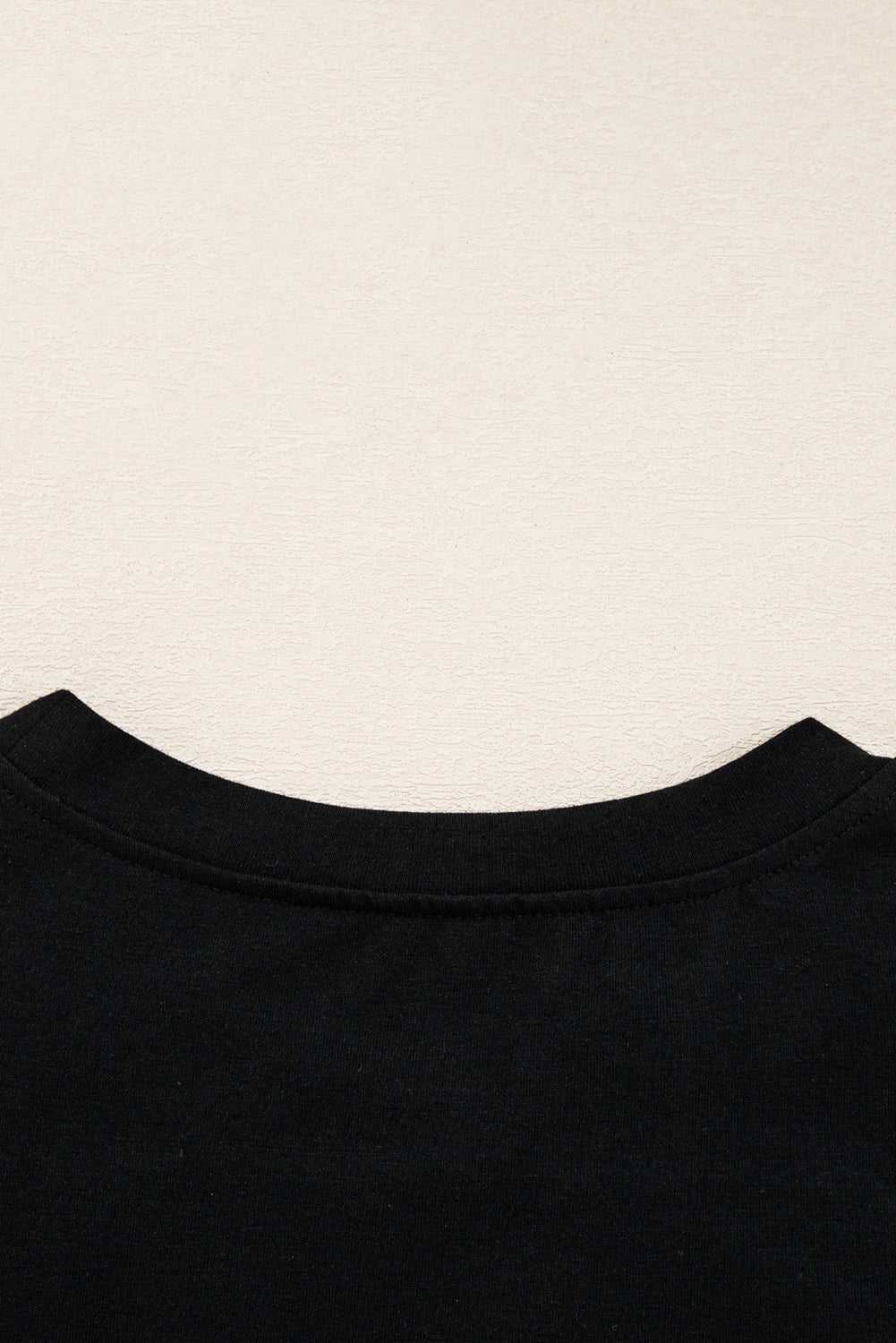 Back neckline detail of the Lace Sleeve Drop T-Shirt - Soft & Comfy | FashionFitz, highlighting the clean stitching and soft black fabric.
