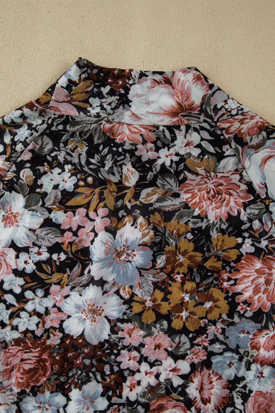 Side view of Floral Mesh High Neck Blouse showing sheer floral mesh drape and ruffled detail — Fashionfitz