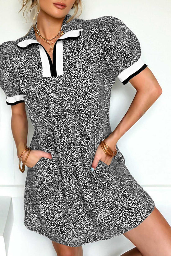 Black Leopard Polo Short-Sleeve Dress with puff sleeves and H-line silhouette, styled for casual summer wear. Features bold leopard print and front pockets.